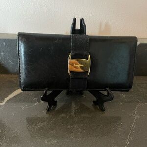 Salvatore Ferragamo long  leather black wallet with gold hardware